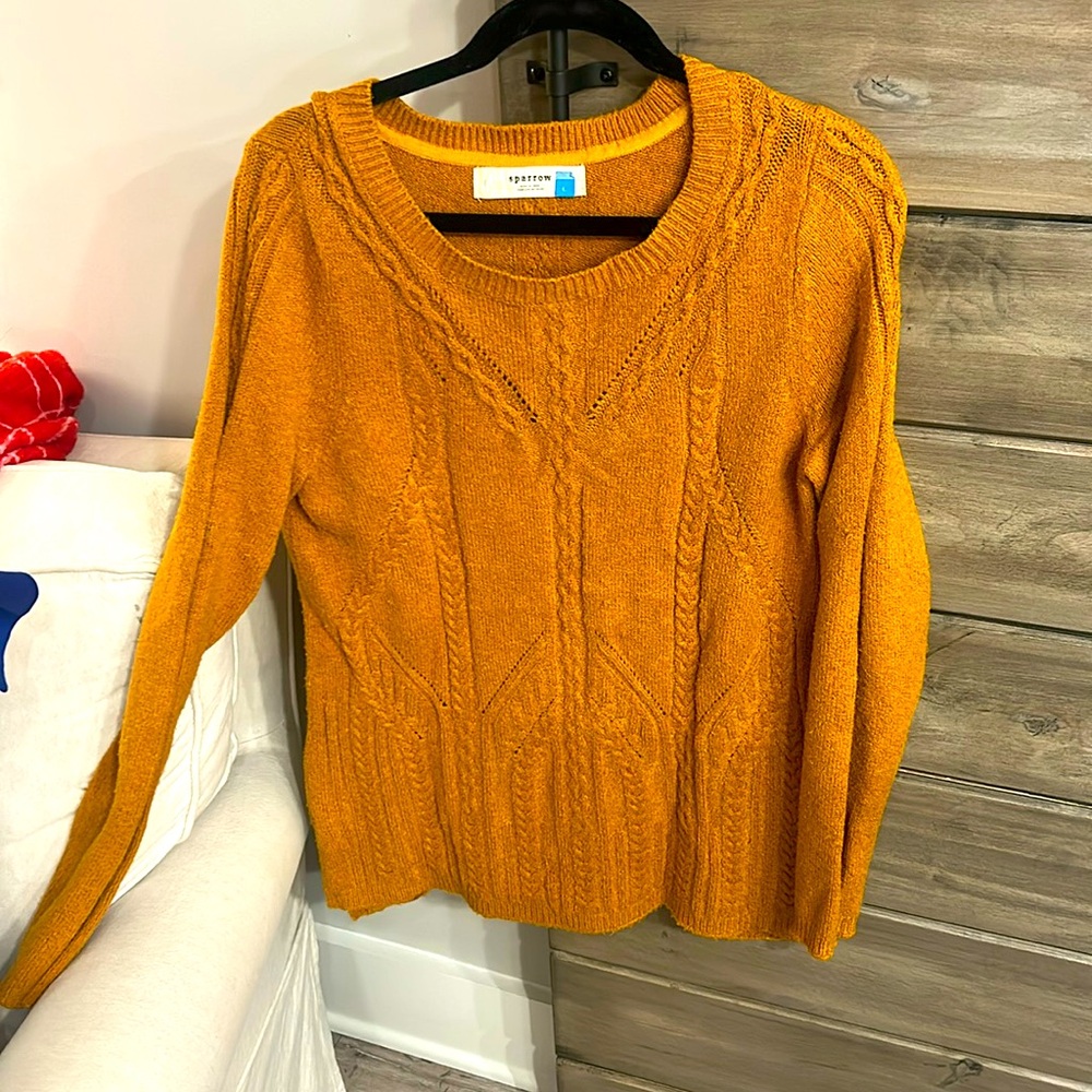 Brunt Orange Anthropologie sweater.